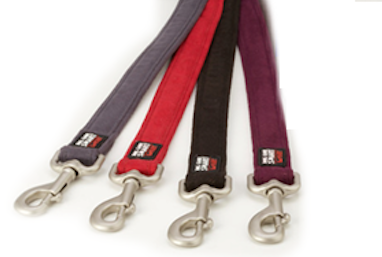 Three dog leashes in black, gray, and purple colors with metal hardware.